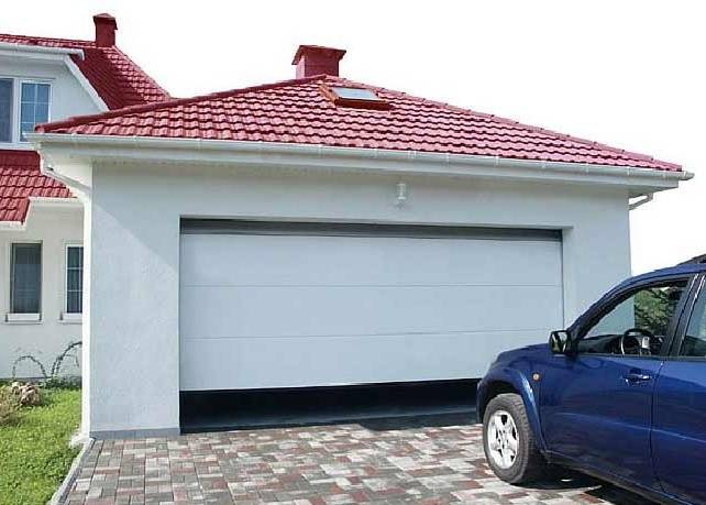 Дачный гараж по стилю должен соответствовать основной постройке